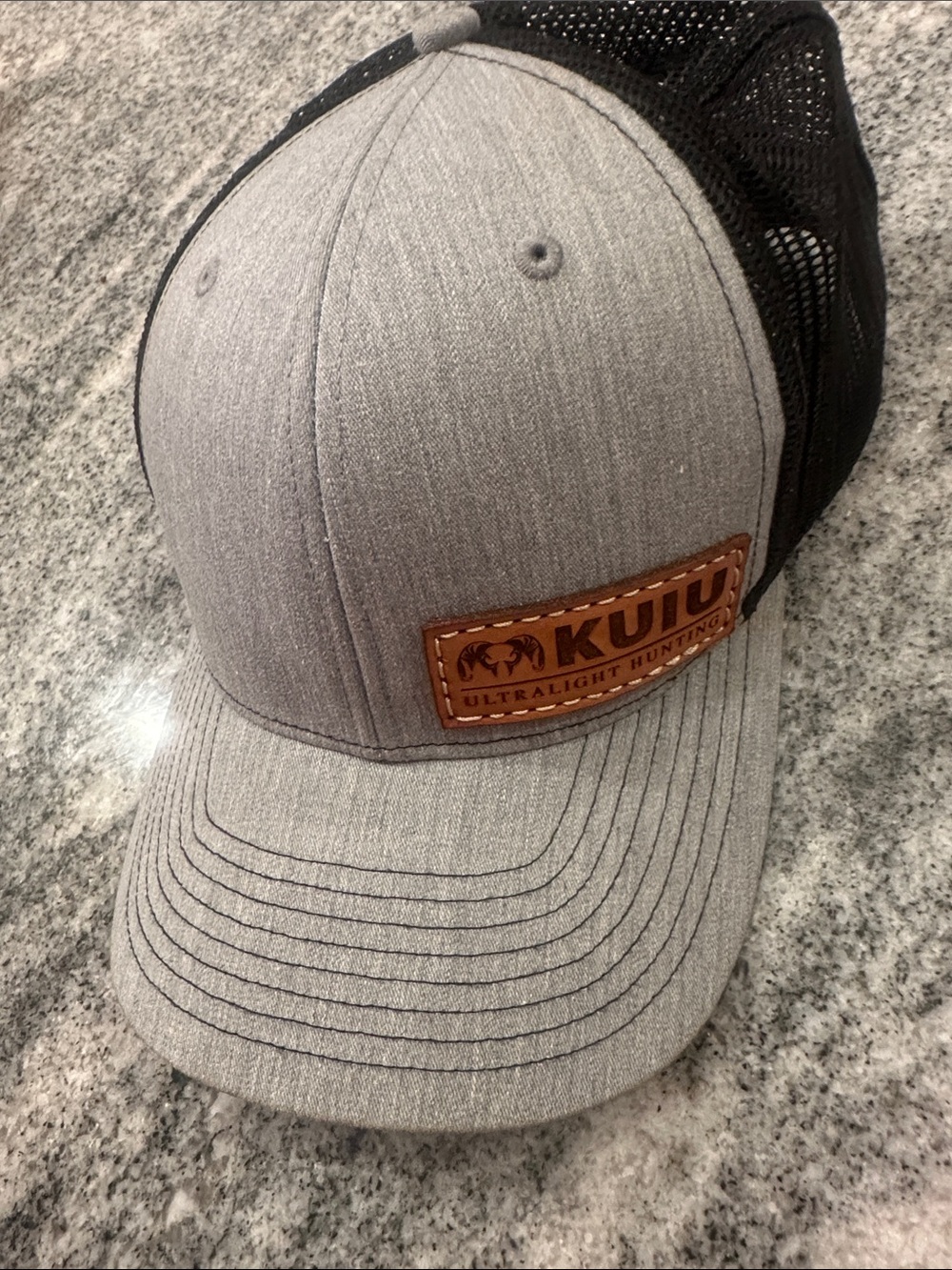 KUIU Heather Gray and Black Mesh Trucker Hat with Leather Patch